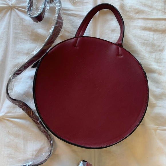 Forever 21 Handbags - NWT Burgundy Circle Crossbody from F21